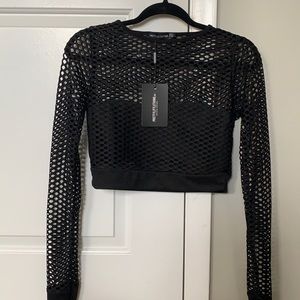 Fishnet long sleeve crop top - prettylittlething